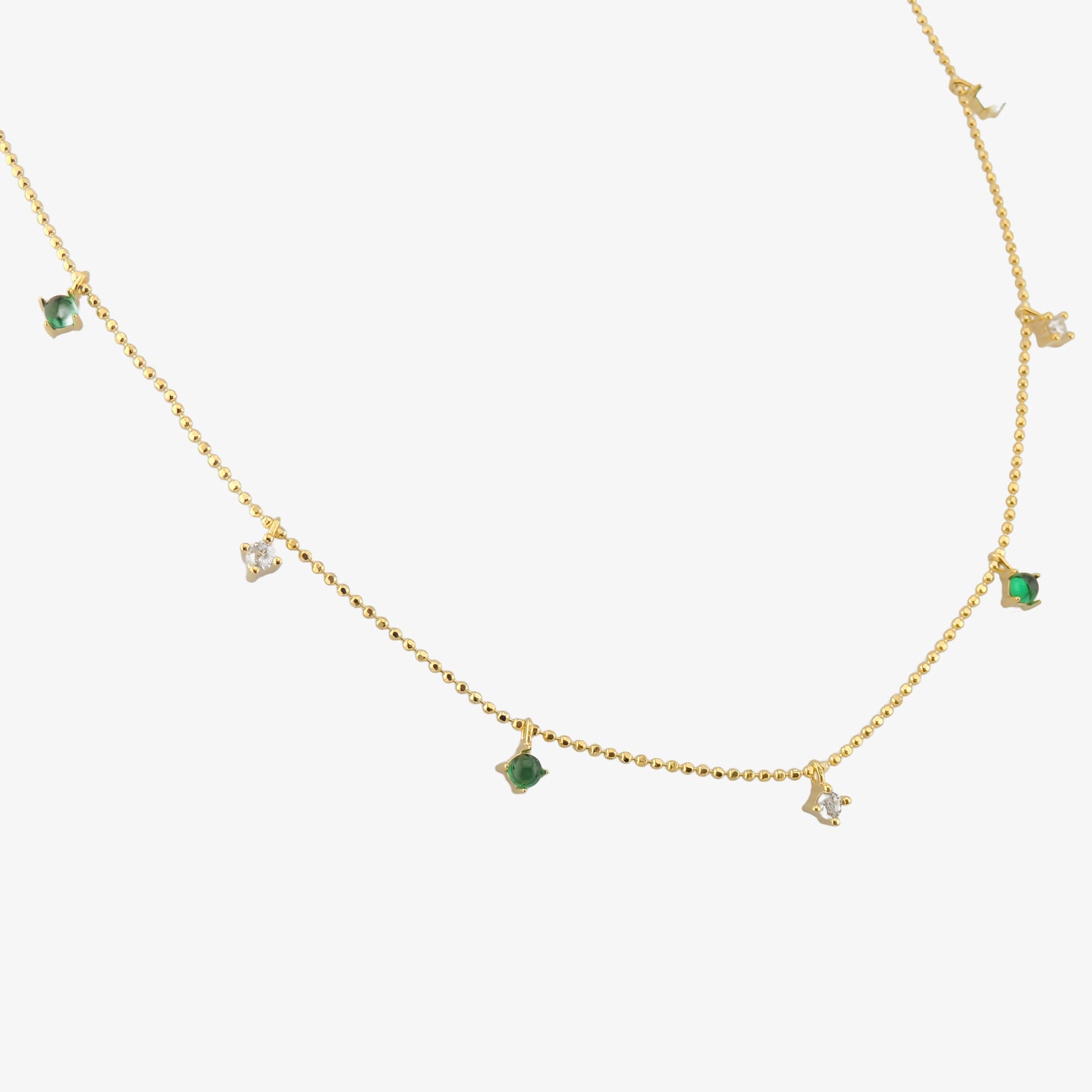 COLLAR LIA. Collar de plata de ley 925 recubierto de oro de 14k con detalles de circonitas blancas y verdes.