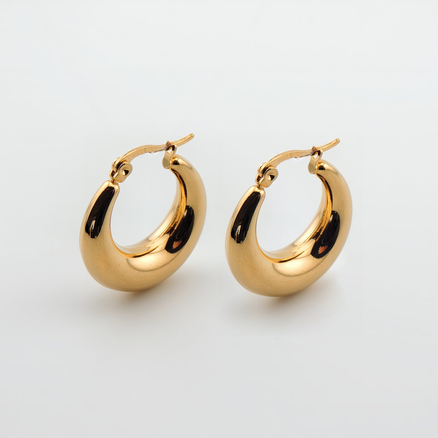 PENDIENTES PILAR. Aros en acero inoxidable bañado en Oro de 18k