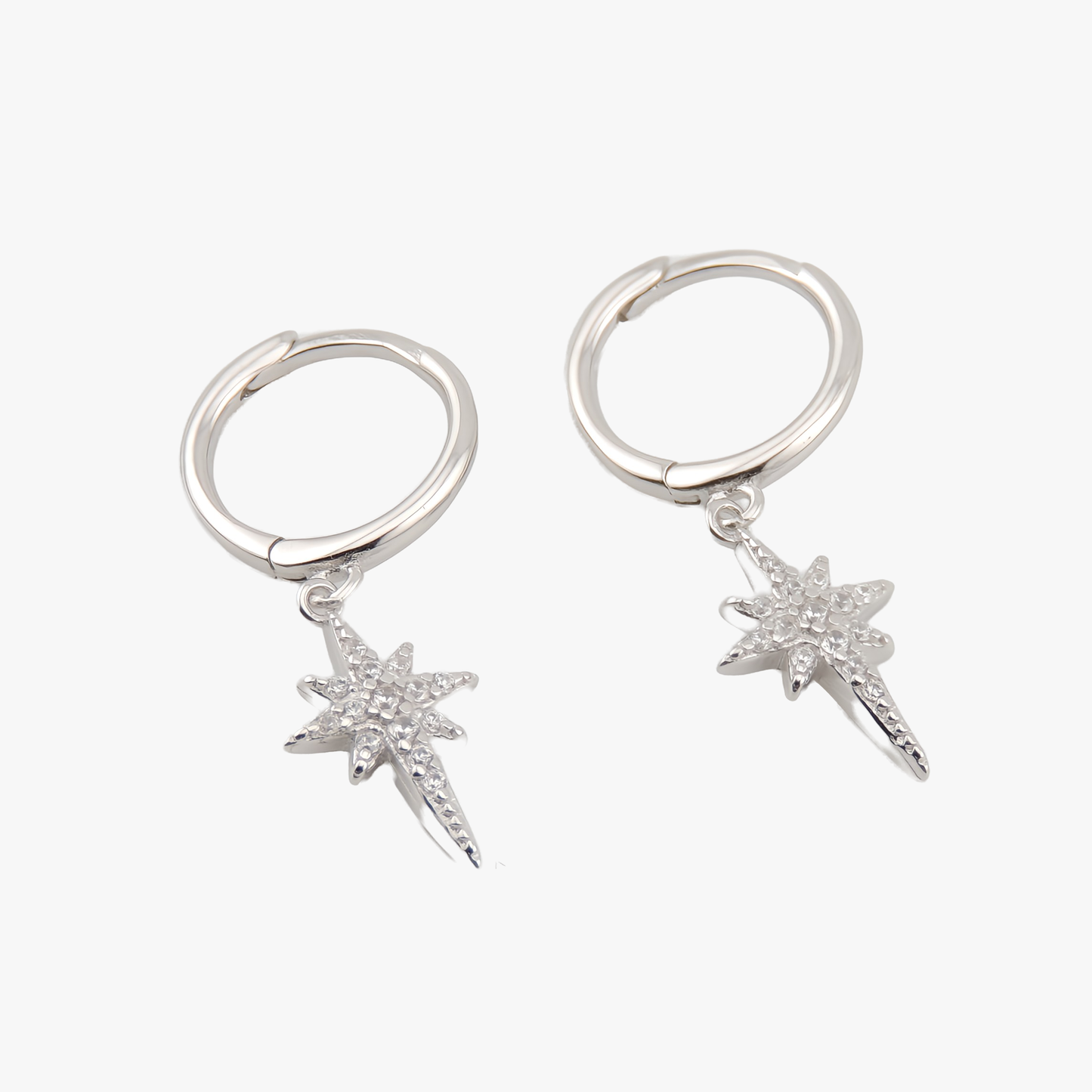 PENDIENTES SARA. Aros de Plata de Ley 925 con colgante de estrella de 8 puntas e incrustaciones de circonitas blancas