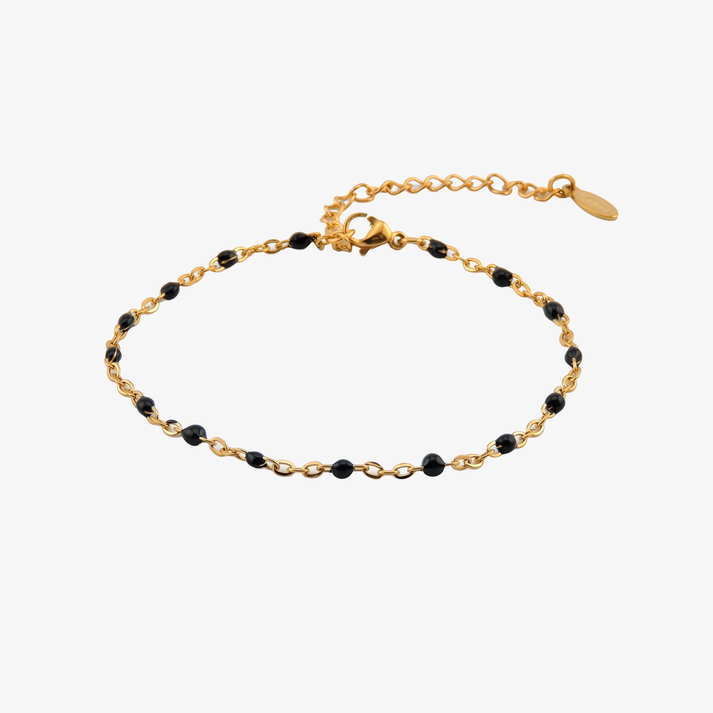 PULSERA ABIGAIL. Pulsera ajustable de acero inoxidable con cuentas de color negro