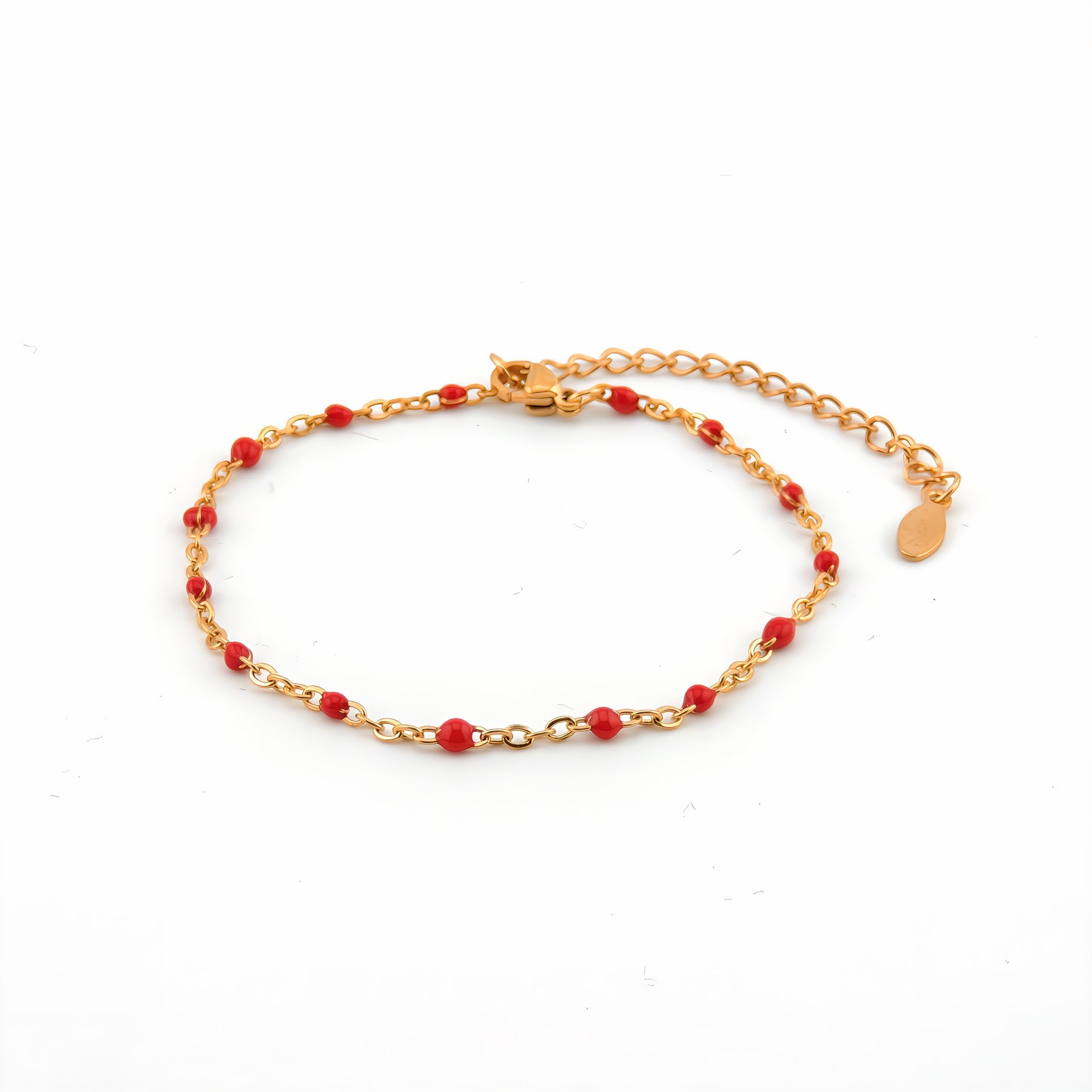 PULSERA MIA. Pulsera ajustable de acero inoxidable con cuentas de color rojo.