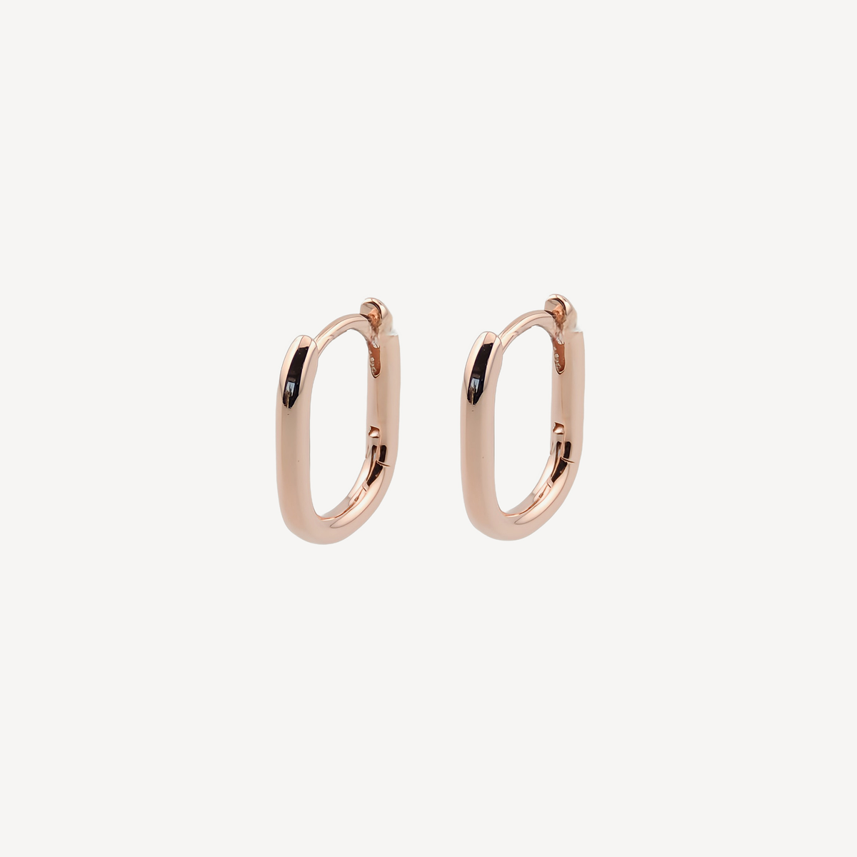 Pendientes Carmela, aros pequeños ovalados de plata bañada en oro rosa, imagen 3