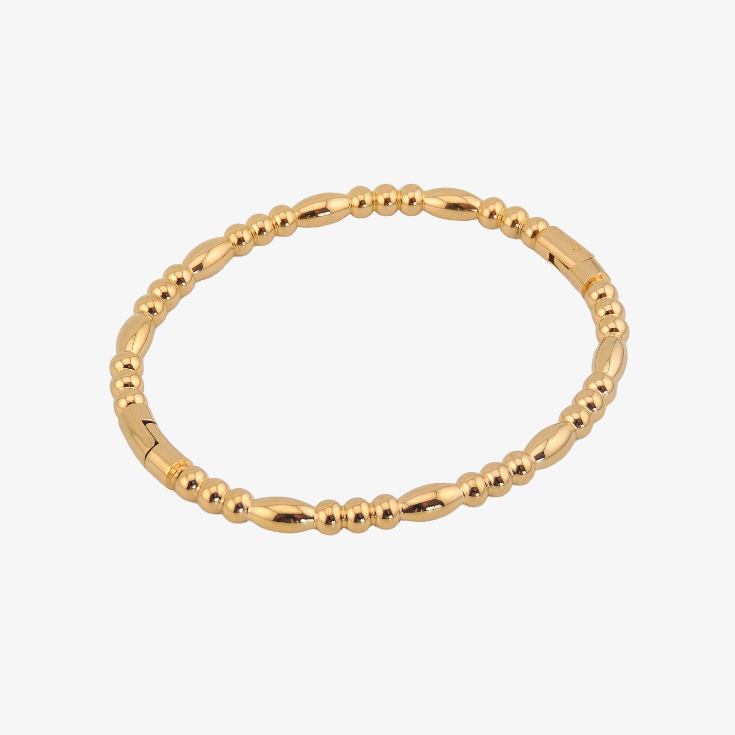 BRAZALETE ÁGATA. Pulsera brazalete rígido de acero inoxidable bañado en oro