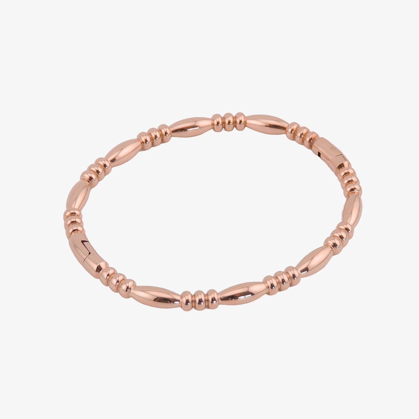 BRAZALETE ALMA. Pulsera brazalete rígido de acero inoxidable bañado en oro rosa