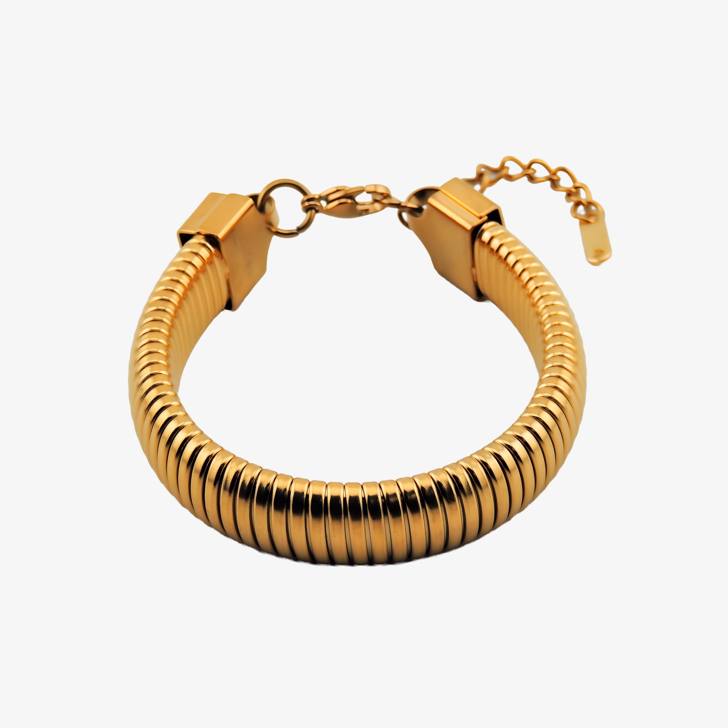 PULSERA CALA. Pulsera ajustable elástica de acero inoxidable bañado en oro
