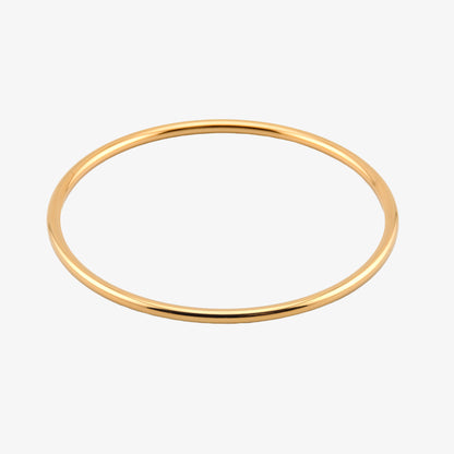 PULSERA CARMEN. Pulsera rígida de acero inoxidable bañado en oro