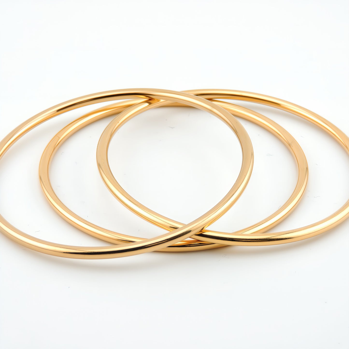 PULSERA CARMEN. Pulsera rígida de acero inoxidable bañado en oro