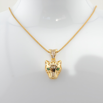 COLLAR LEONOR. Collar de acero inoxidable recubierto de titanio bañado en oro de 18k y colgante con forma de pantera con detalles de circonitas