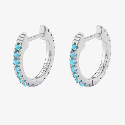 PENDIENTES CELIA. Aros en Plata de Ley 925 bañada en Oro de 18k con circonitas talladas en color azul turquesa