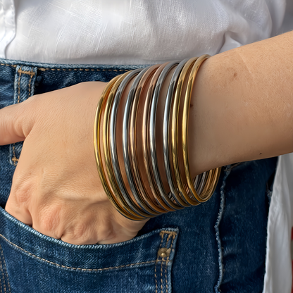 PULSERA CARMEN. Pulsera rígida de acero inoxidable bañado en oro