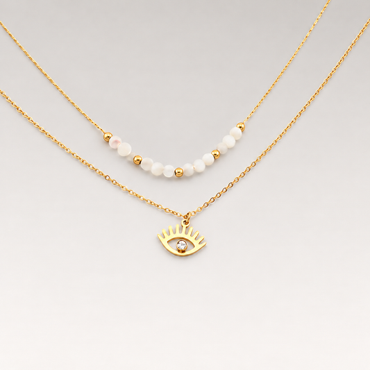 Collar doble de acero inoxidable bañado en oro de 18K con cuentas blancas y colgante de ojo