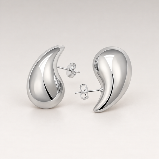 Pendientes muy grandes en forma de gota abombada de cobre en color plateado con cierre de tuerca